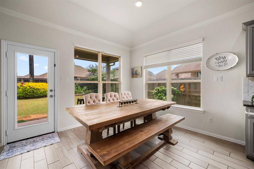 The Breakfast Area just off the Kitchen is large enough to be your main dining area if you choose to utilize the Formal Dining Room as another option