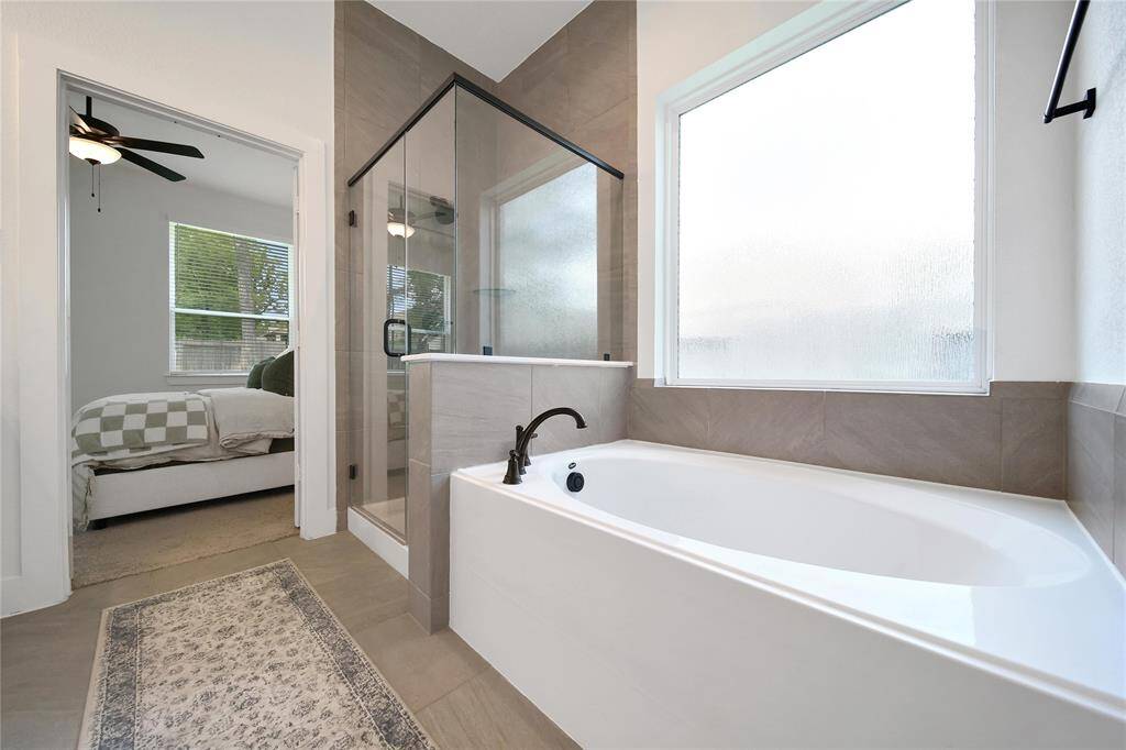 Whether you prefer to relax with a long soak in the garden tub or a hot shower, this bath has everything you need.