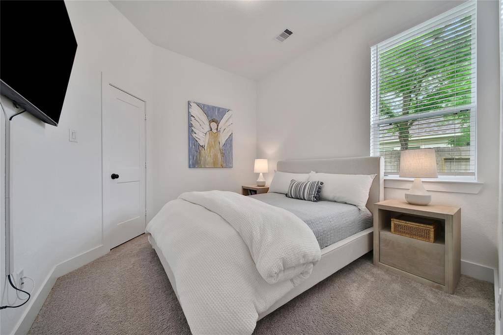 Secondary bedrooms are light and bright with generous closet space.