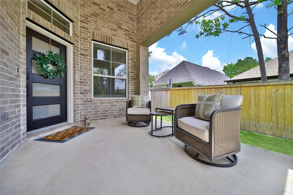 A large, welcoming front porch is a wonderful bonus outdoor space that's perfect for a small patio set.