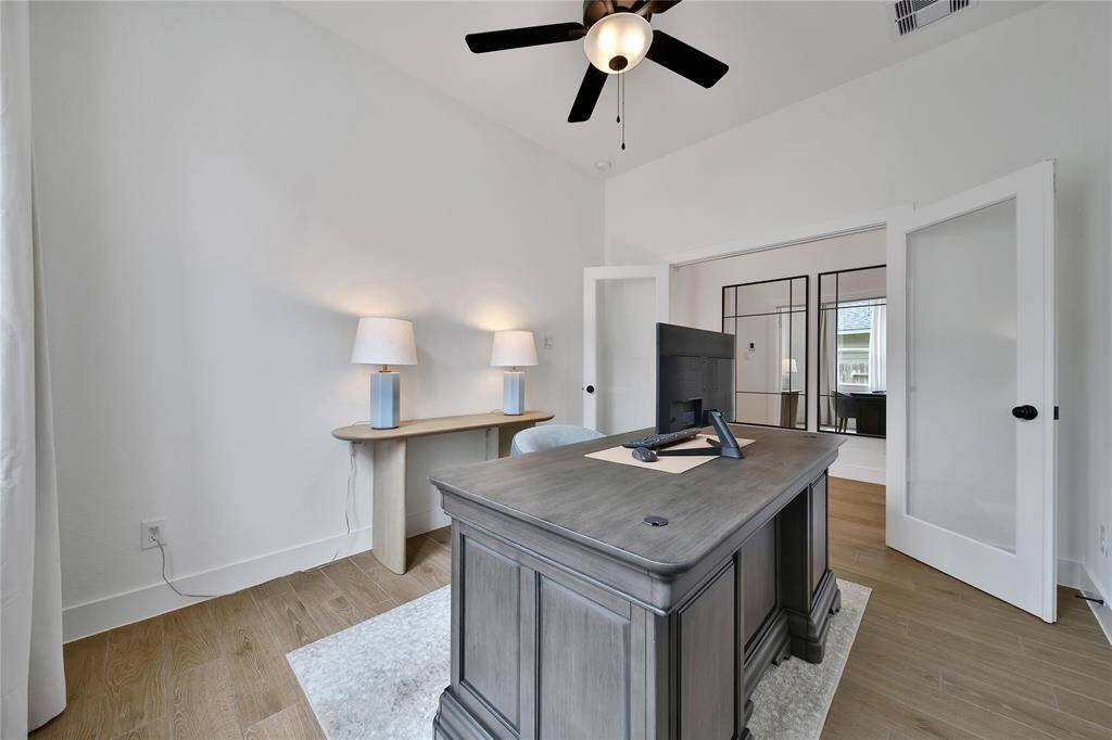 There's an awesome closet with built-in shelving that helps to keep your office neat and tidy. This closet also allows this space to easily function as a 4th bedroom if needed.
