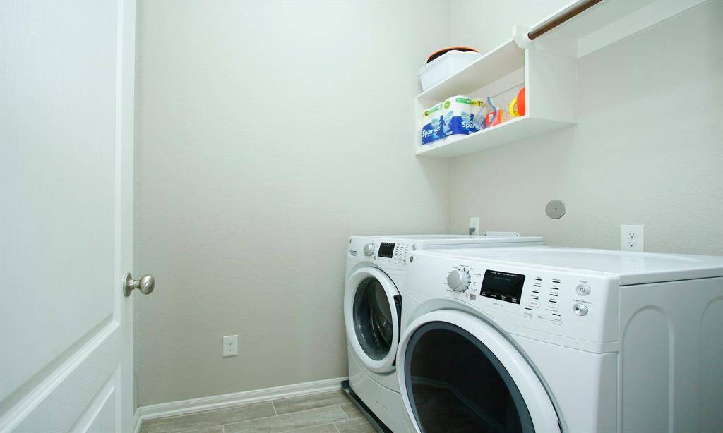 Utility  room is just off the kitchen.