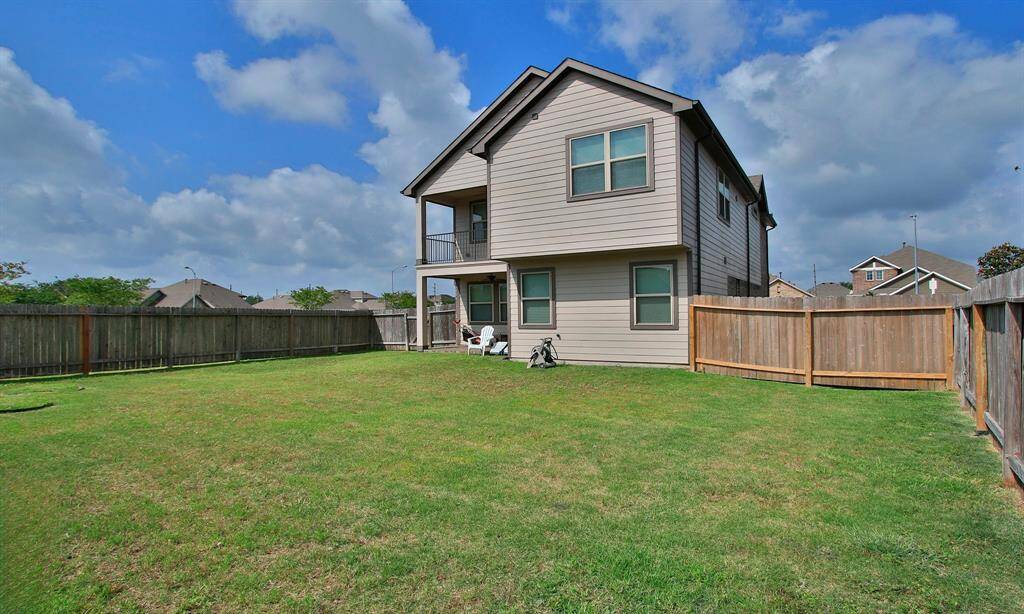 Grass stays green because of the front and back sprinkler system.