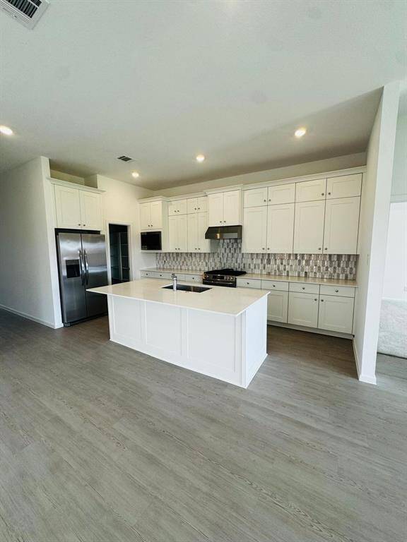 Plenty of cabinets in the Kitchen