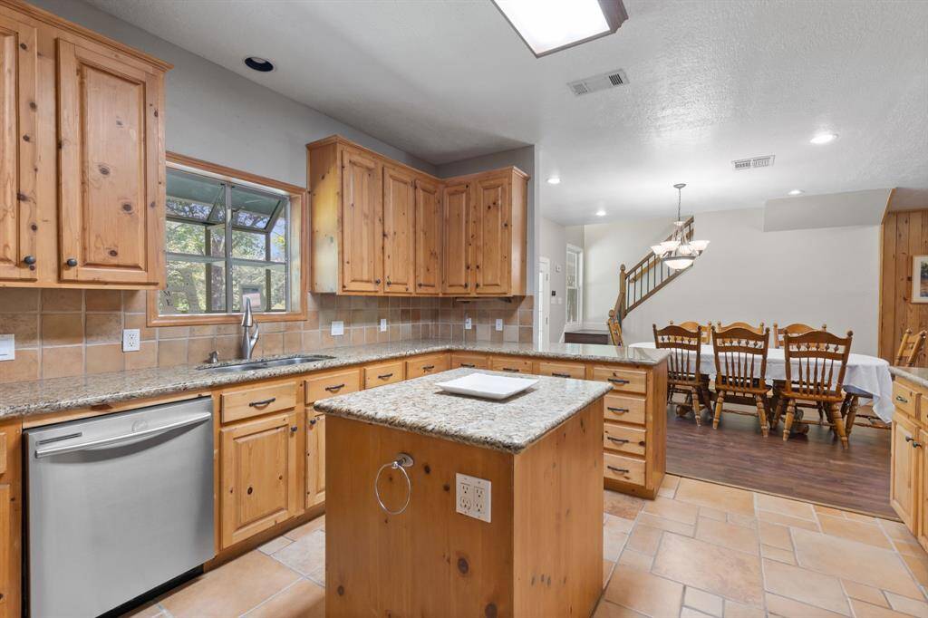 Perfect for entertaining with so much room to spread out. Great open concept flow from kitchen to dining to living.