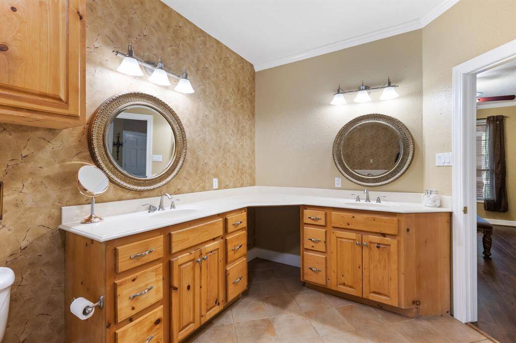 Room in corner for vanity chair to tuck in.