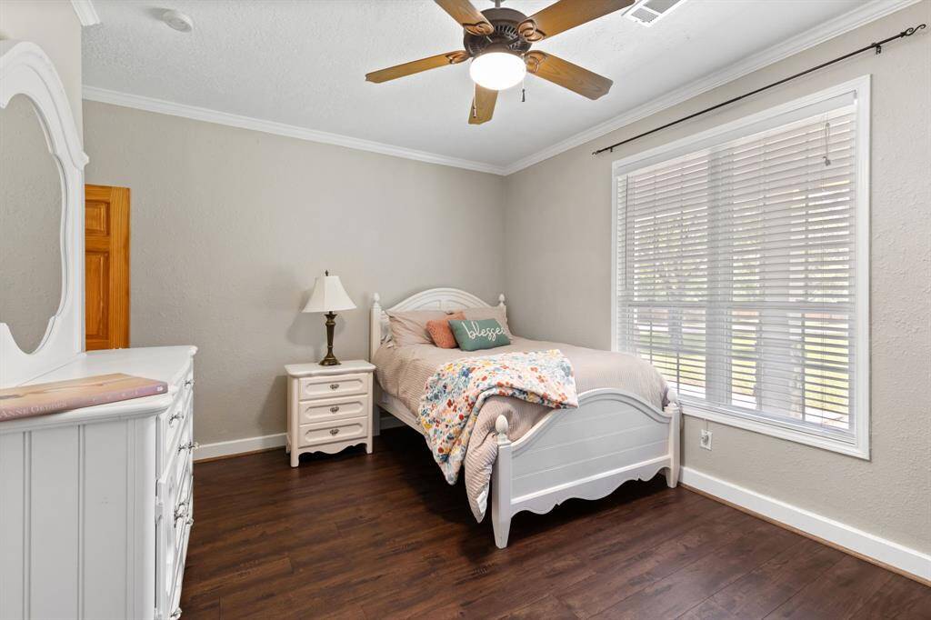 Secondary bedroom on first floor is perfect for guests, children or MIL bedroom with full bath down for private use. Great closet space and natural light.