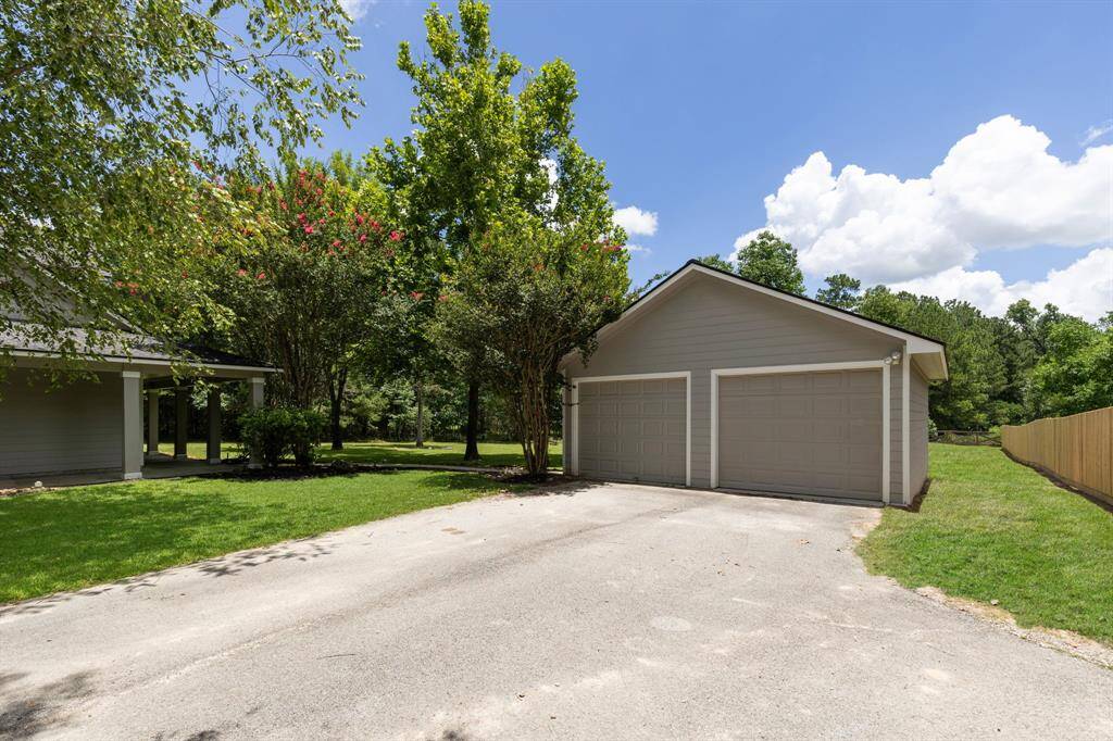 Detached garage with openers.