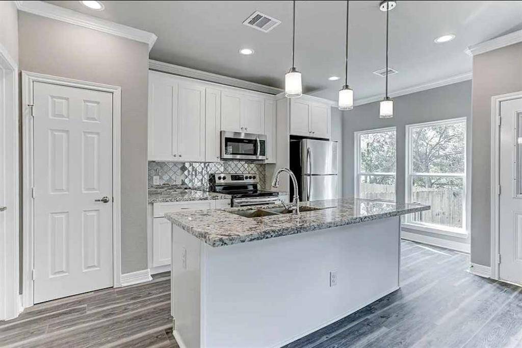 Beautiful custom kitchen with huge island