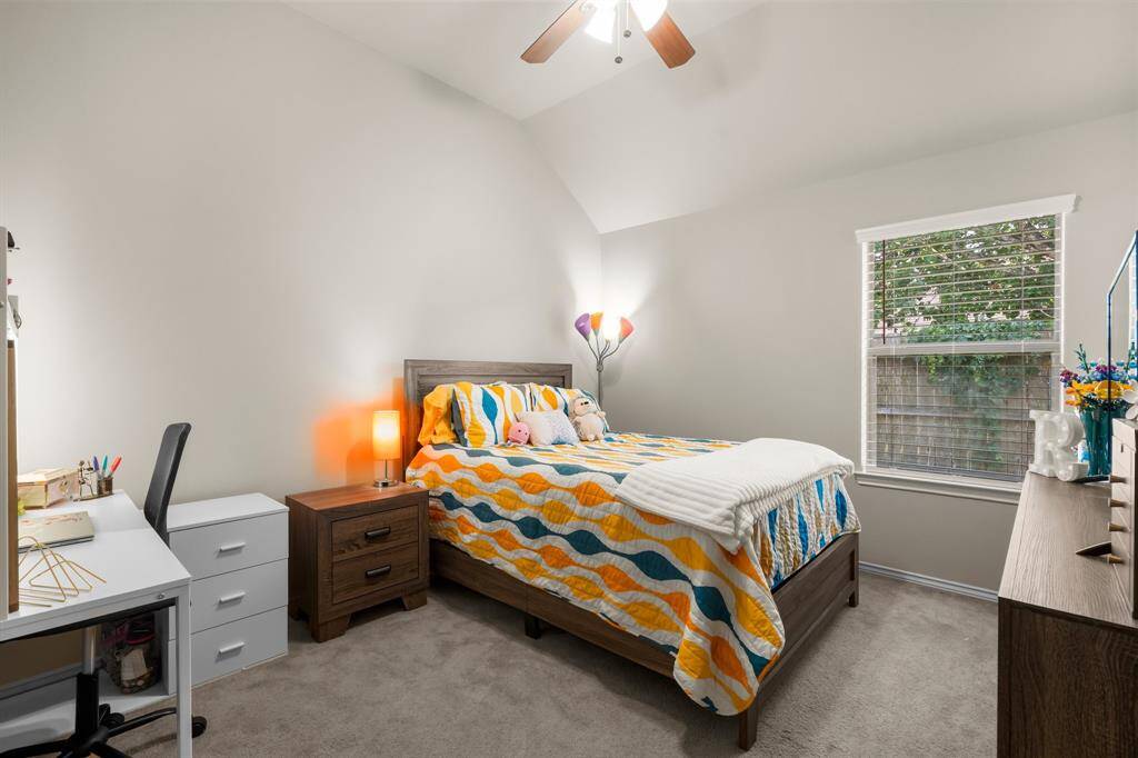 This large secondary bedroom is filled with natural light and features freshly painted walls and recently cleaned carpet; offering a bright, clean, and comfortable space for family, guests, or a home office.