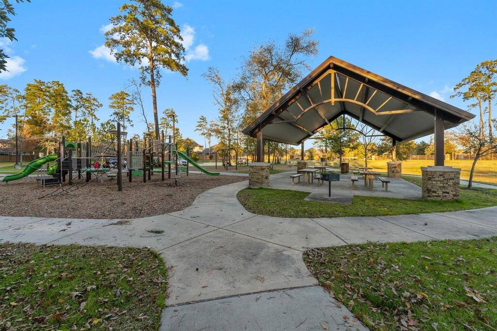 The pavilion and adjacent park provide the perfect setting for outdoor lunches, gatherings, and leisurely playtime surrounded by beautiful green space.