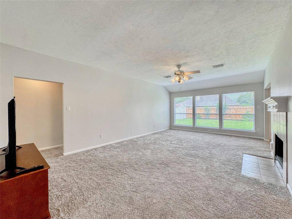 Large living room with gas log fireplace