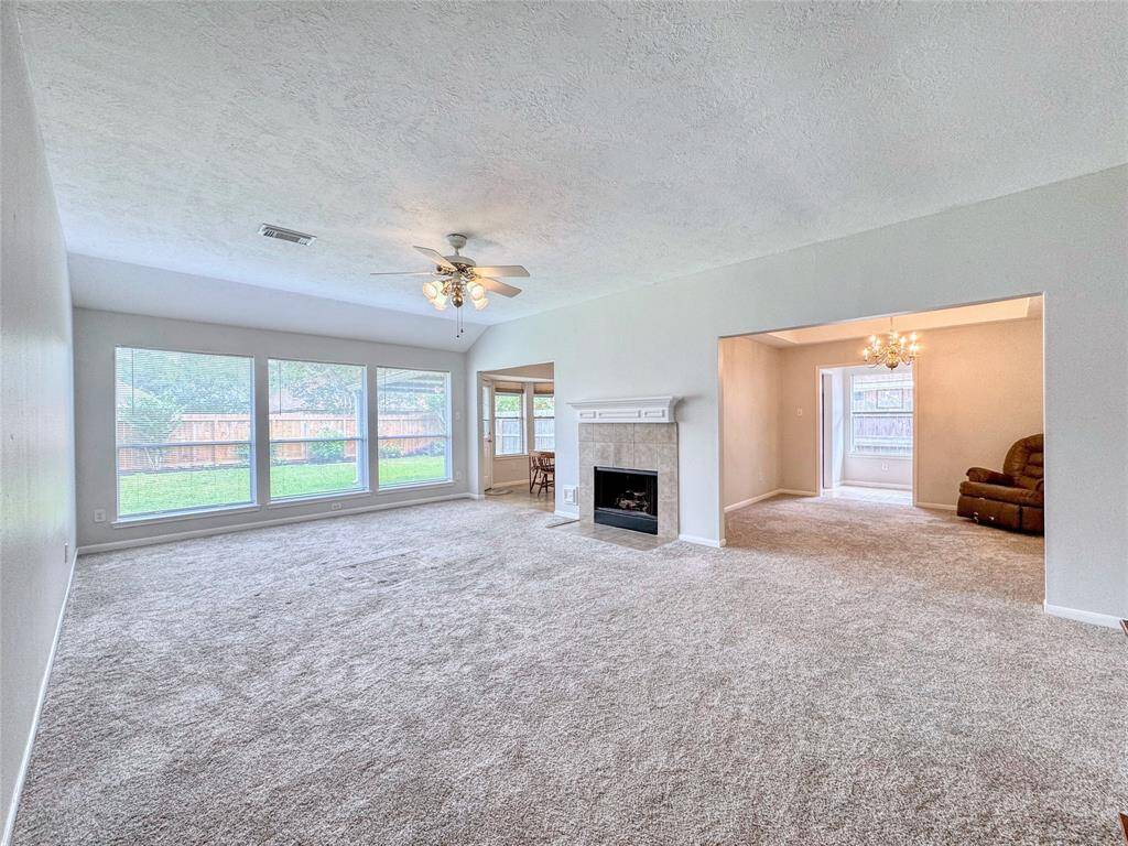 Large living room with gas log fireplace