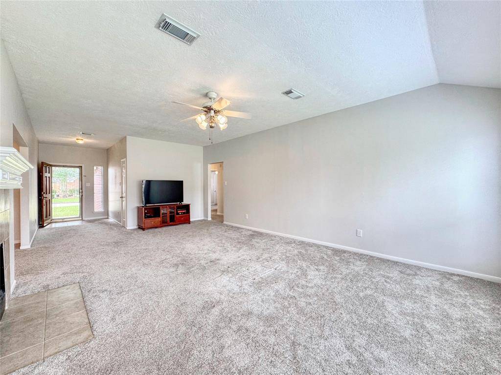 Large living room with gas log fireplace