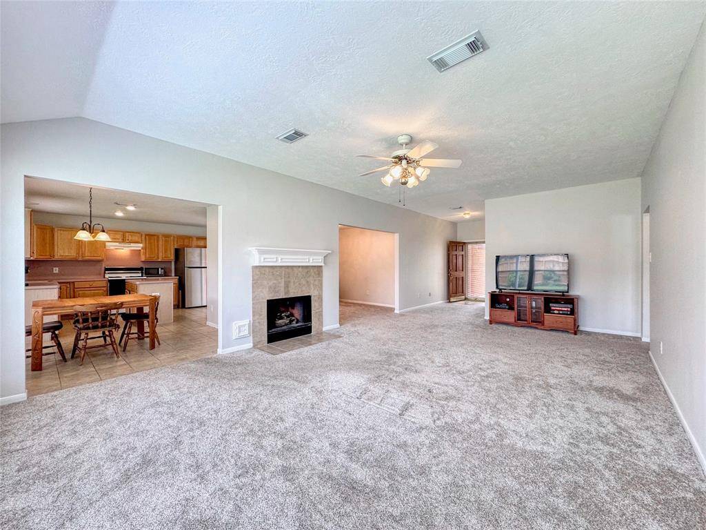 Large living room with gas log fireplace