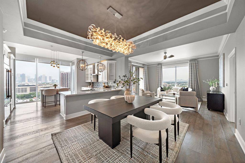 Reimagined corner unit at The Royalton pairs panoramic downtown views with refined, designer-updated interiors. Floor-to-ceiling windows, a private balcony, quartz-appointed kitchen, and curated lighting define this lock-and-leave home. Enjoy premium amenities, direct access to Buffalo Bayou trails, and proximity to premier dining, shopping, and Houston’s key business districts.