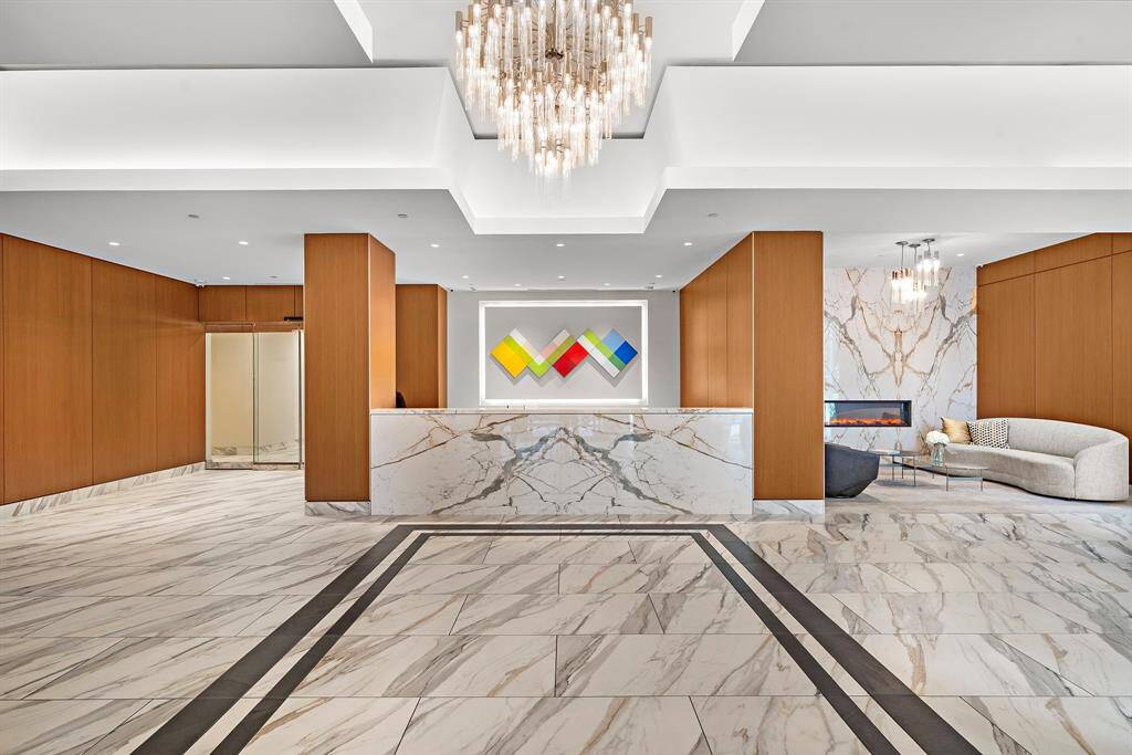 Framed by stone finishes and soft lighting, the concierge station anchors the heart of The Royalton’s lobby, designed to balance elegance with everyday convenience.
