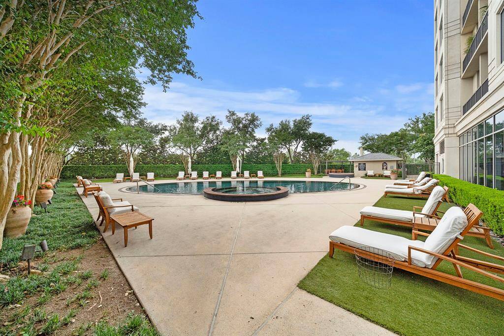 The Royalton’s resort-style pool is surrounded by lush landscaping and cushioned loungers, creating a private retreat just steps from the tower.