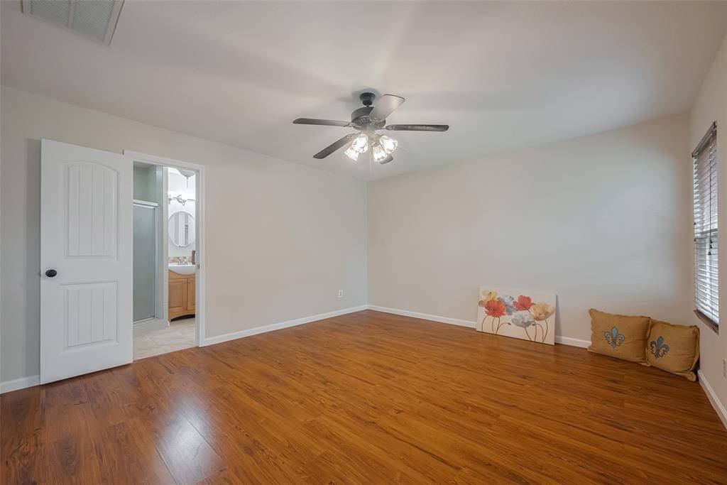 The owners suite is tucked away downstairs for convenience and privacy.  it is large enough to accomodate a king size bed, dresser and night stands.  Again, no carpet here.  All floors are care free.
