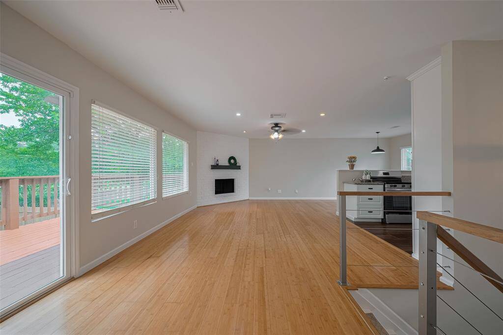 And these doors and windows are the low-E windows. Beautiful real bamboo wood floors are beaming throughout this living area.