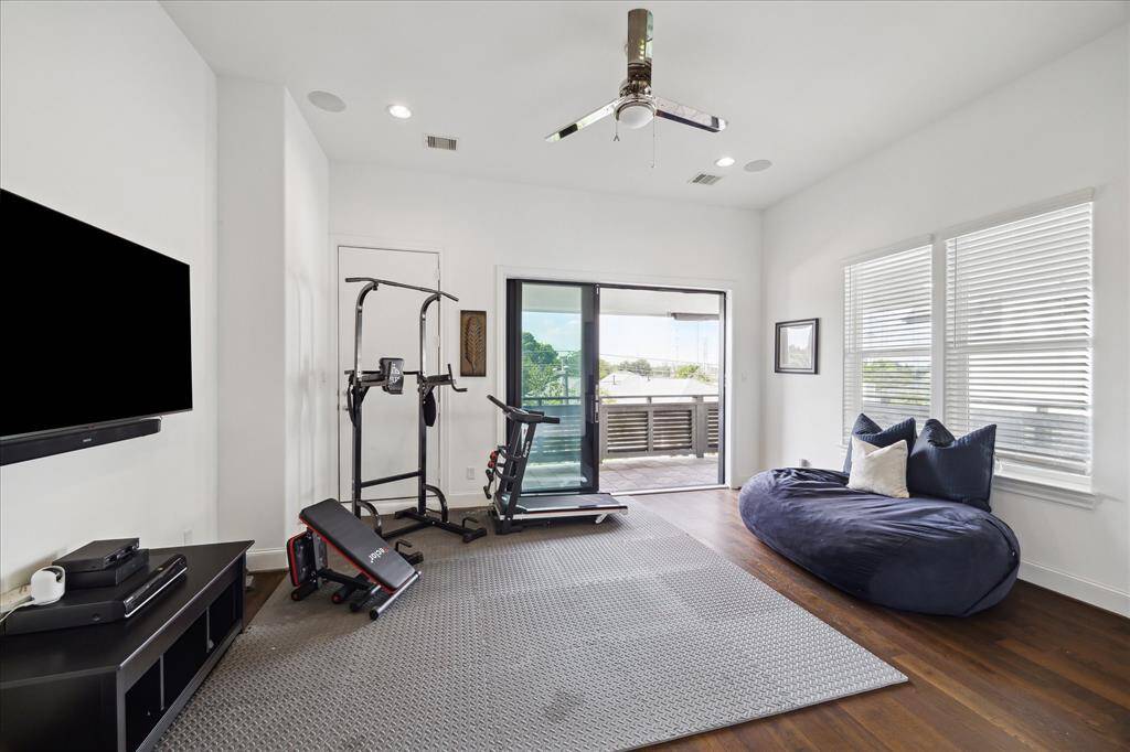 This versatile game room opens to a spacious covered balcony and offers plenty of room for lounging, entertaining, or customizing to suit your lifestyle.