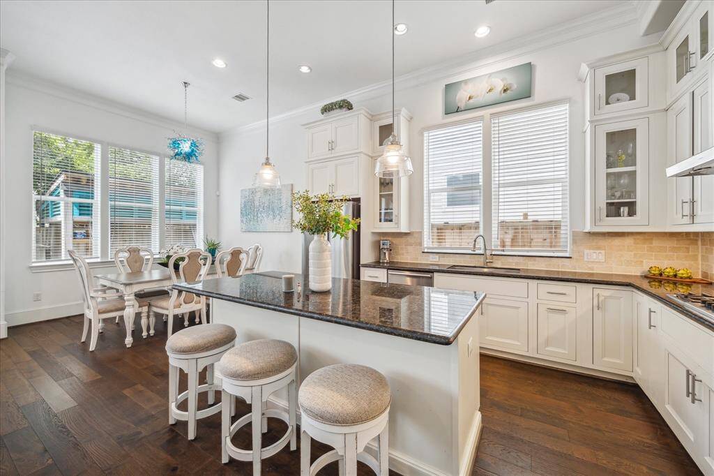 Enjoy effortless flow from the kitchen into the light-filled dining area—ideal for hosting guests or everyday meals with a view of the backyard.
