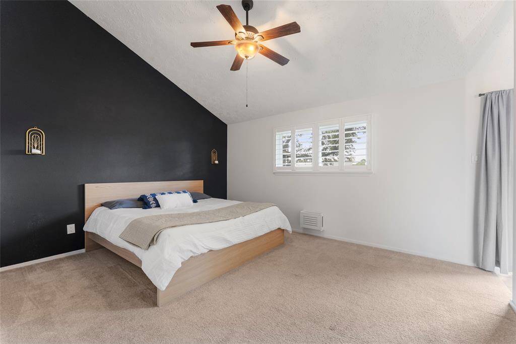 You'll love the high ceilings in the large Primary Bedroom.