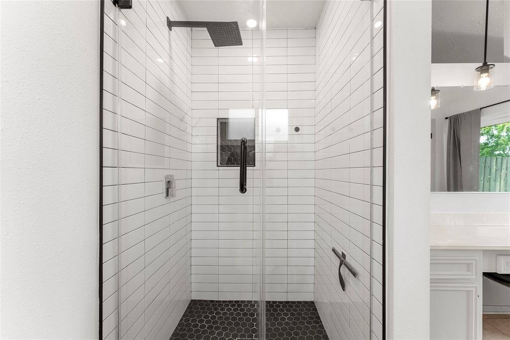 The updated shower in the Primary Bathroom.