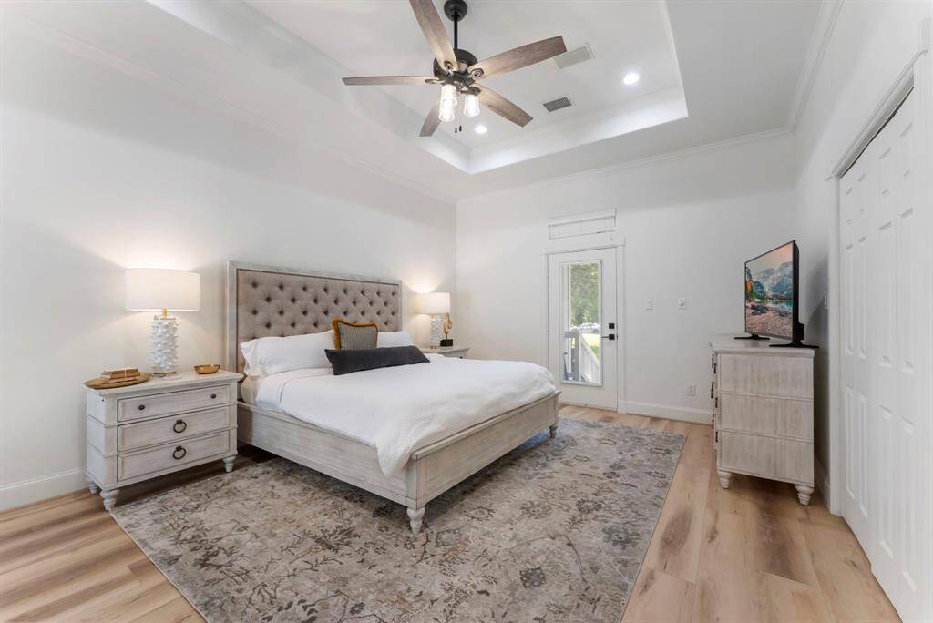 Very large primary with 2 private porch areas