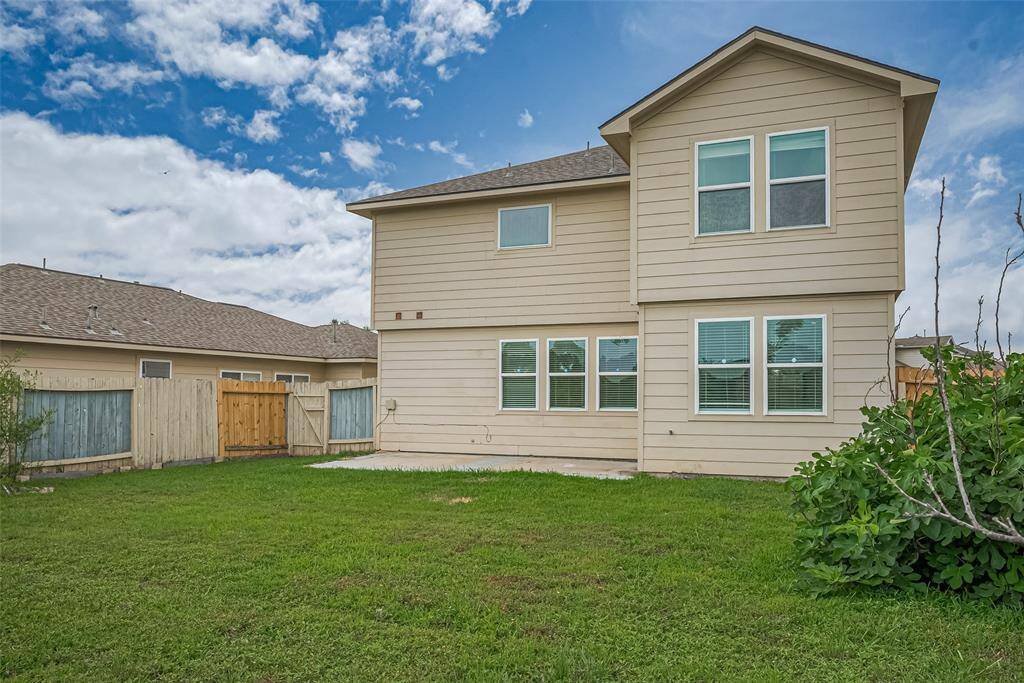 Backyard views from both floors, bringing in natural light and serene scenery throughout.