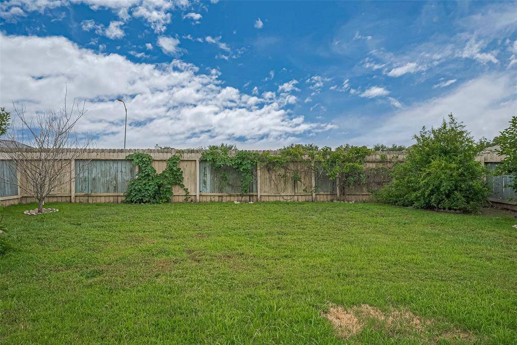 Enjoy added privacy with no direct neighbors behind the home—peaceful and open views await.