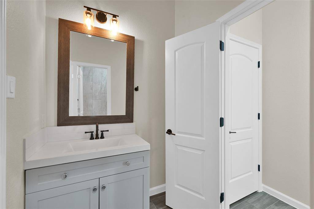 Full bath connected to the first floor office.