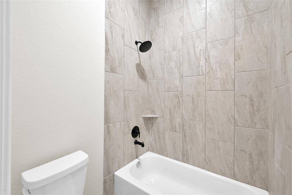 Full bath connected to the first floor office.