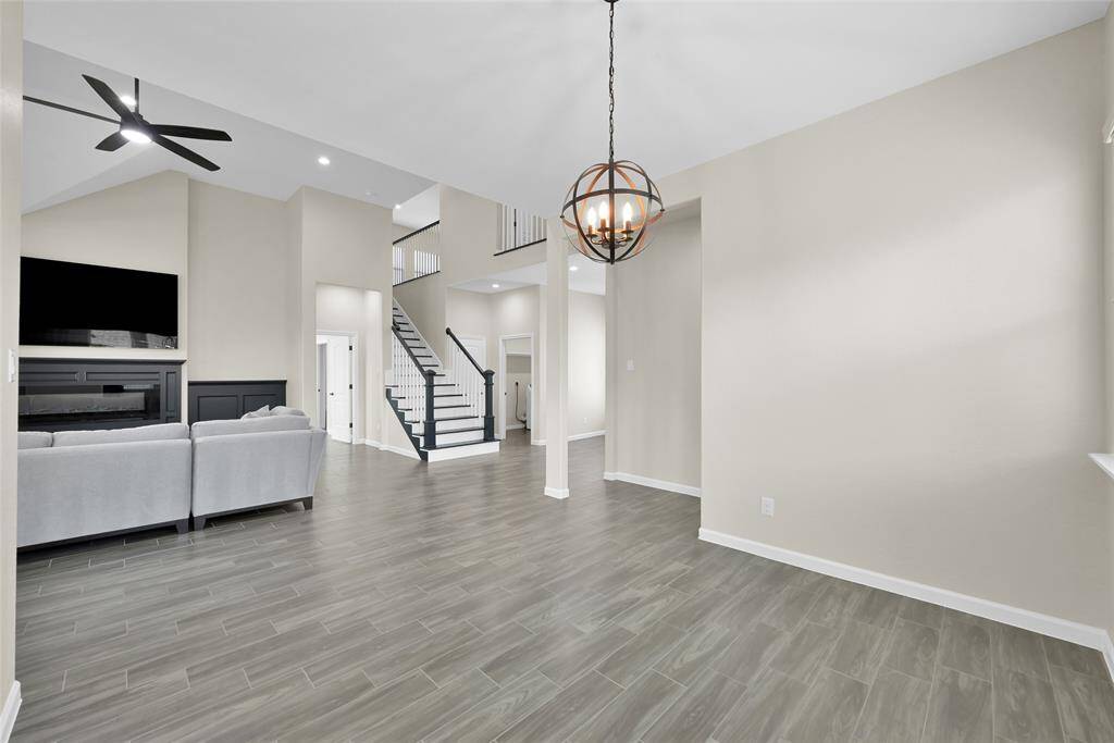 Airy and open with impressive ceiling heights that add volume and style throughout the home