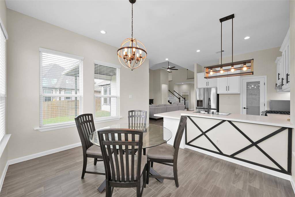 Sunny breakfast nook overlooking the backyard—perfect for casual meals.