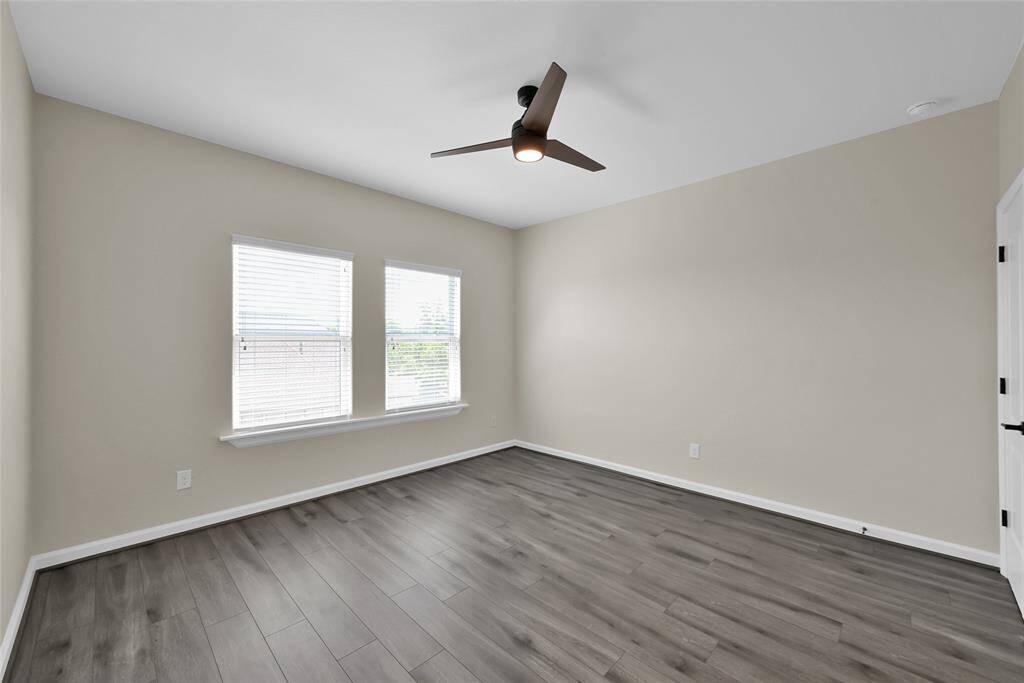 Additional bedrooms provide options for guests, remote work, or recreation.