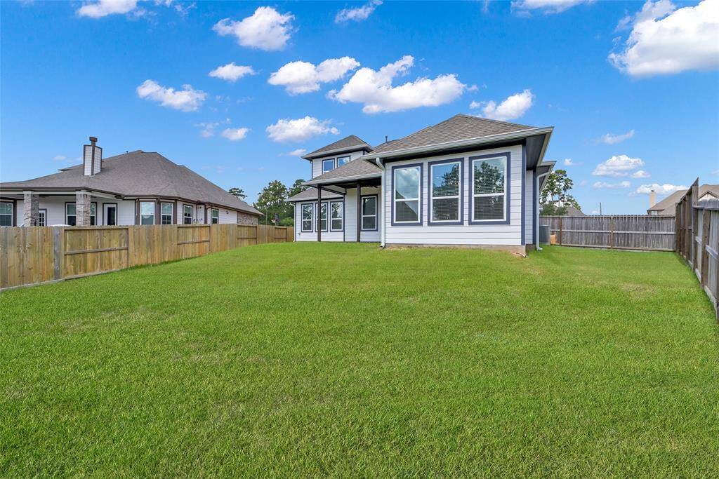 The backyard offers endless possibilities.. add a pool, lush landscaping, or both to create your own private oasis