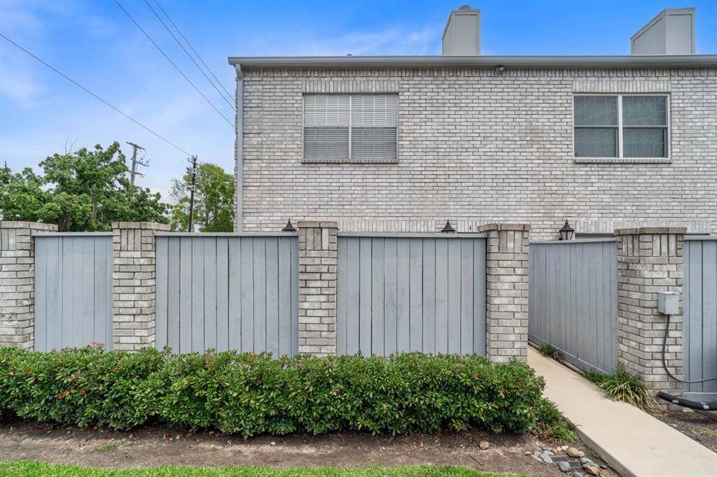 This fully fenced Private patio wraps around with French Door and Back door access.