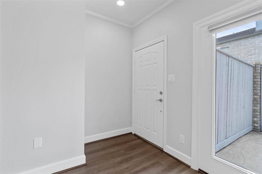 This light and bright entry way from the front door is very inviting.