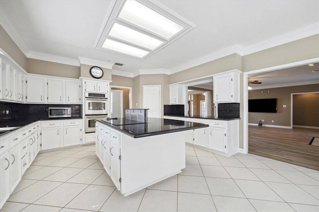 This lovely kitchen is designed with the home chef in mind—offering both charm and functionality for everyday meals or gourmet creations.