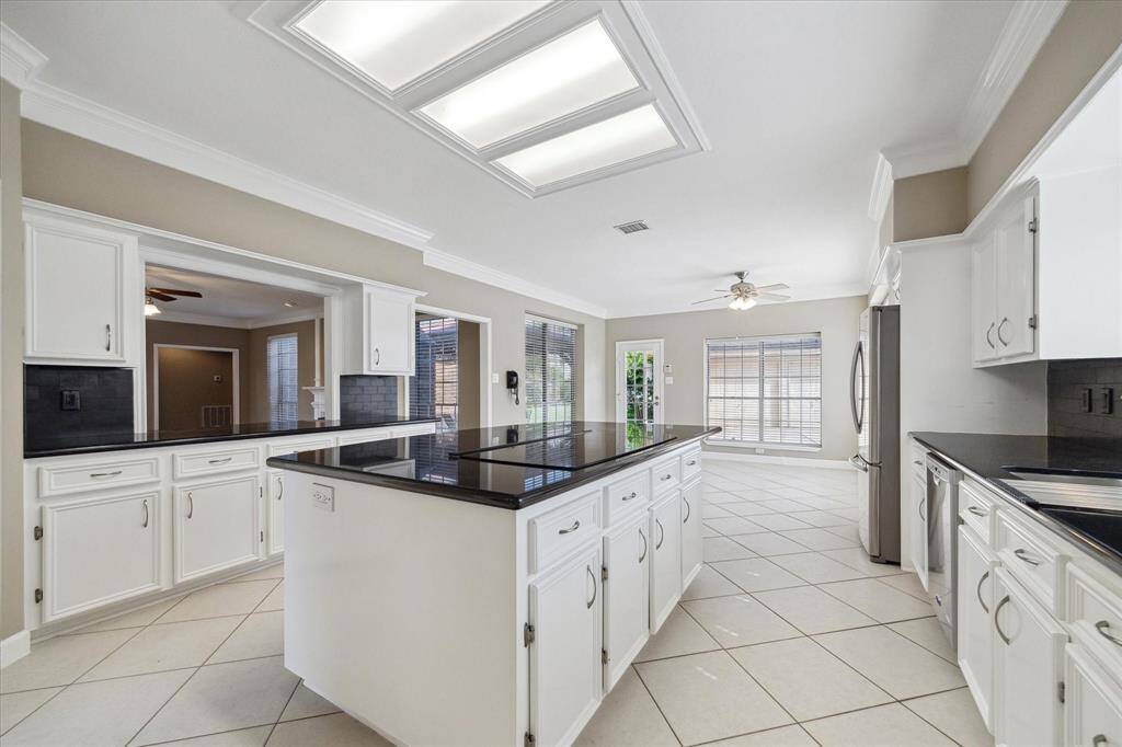 This stellar kitchen offers exceptional This stellar kitchen offers exceptional storage with abundant cabinetry and thoughtfully designed spaces to keep everything organized and within reach