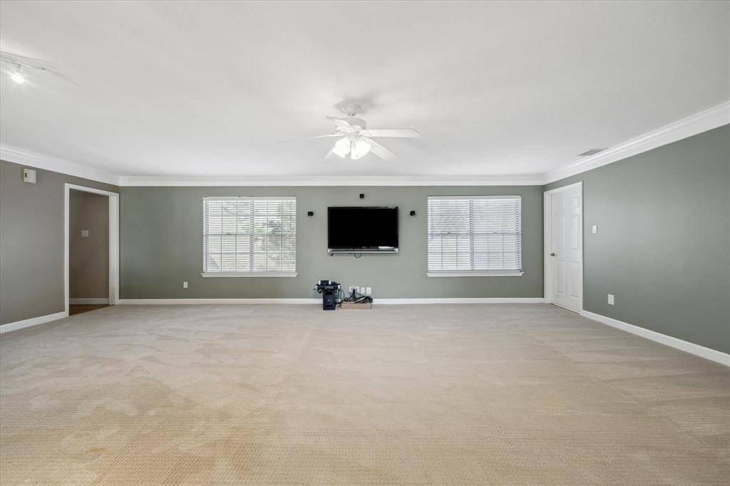 Another view of the incredible and versatile game room, perfect for family game night!