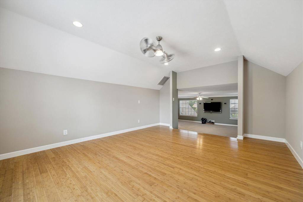 Modern ceiling fan enhances comfort and style in the media room.