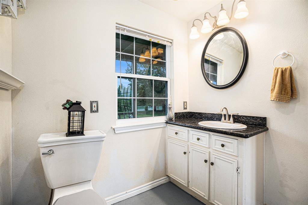 The half bath is located on the first floor and has some extra storage space.