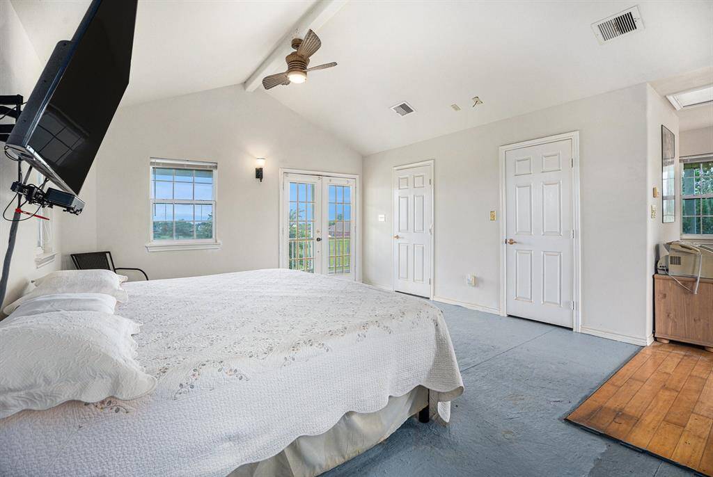 There is a walk-in closet, sitting area and porch access via two sets of exterior doors in the owner's retreat.