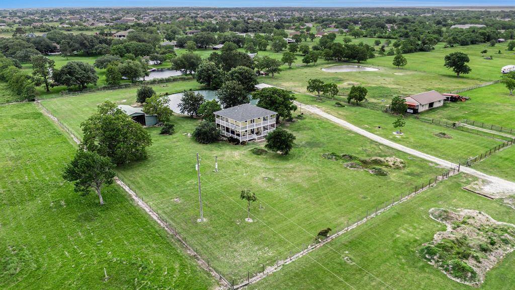 The back portion of the property is fenced with a gate across the road.  Seller has brought in approximately 30 loads of dirt