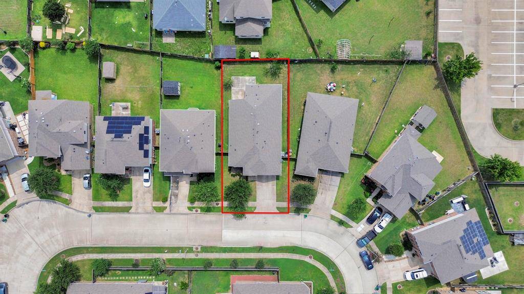 This house is highlighted in red. The home has a fenced backyard and is part of a cul-de-sac.