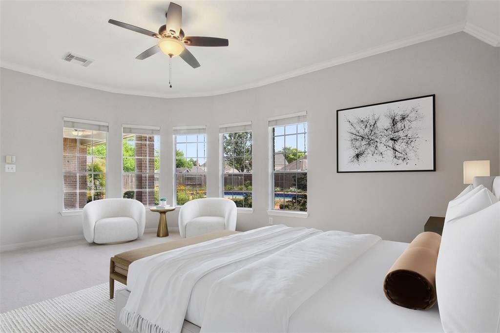 Primary Bedroom overlooking back yard Oasis.