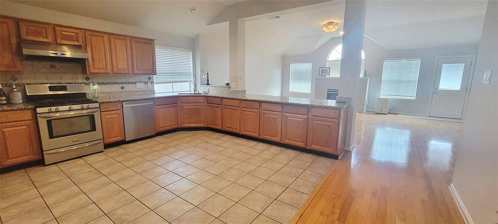 Kitchen opens to family room.