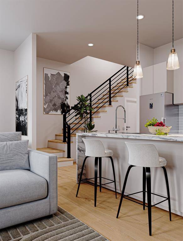 Photos are renderings—actual fixtures and finishes may vary.
